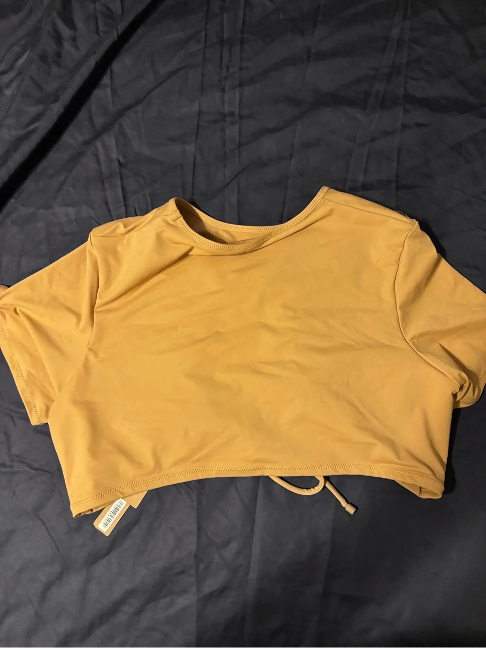 SKIMS SWIM RUCHED T-SHIRT and LOW RISE TIE BIKINI BOTTOM in Ochre